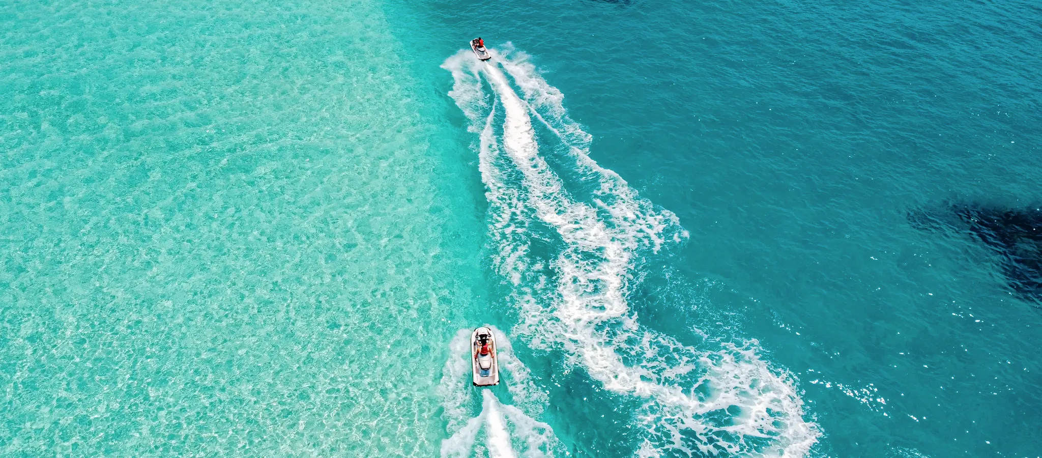 Aerial view of Maldives or Florida sea or ocean jet skis, tropical summer vacation or second home life style. Vacation, retirement or estate planning inspiration theme stock photo.
