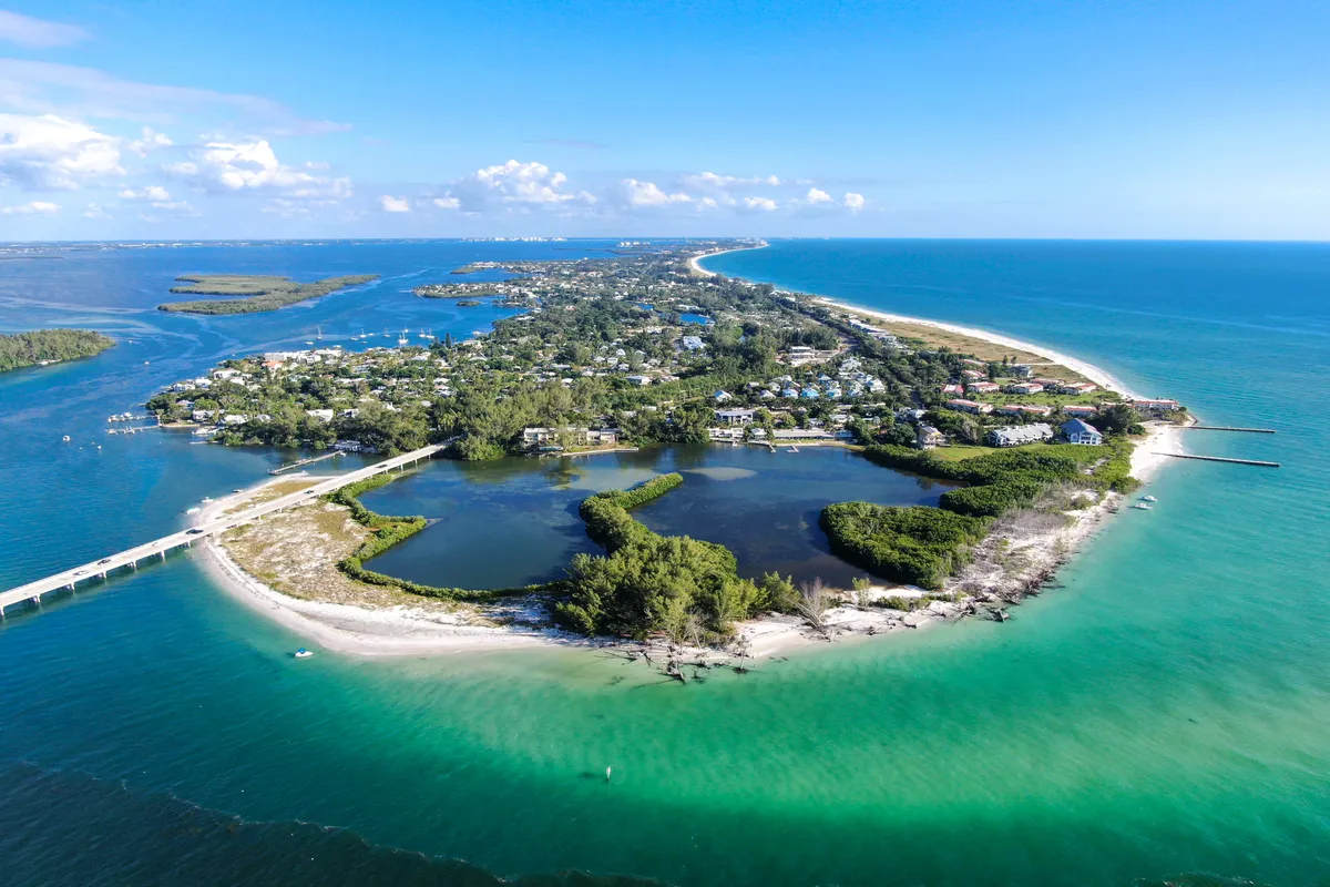 Nice looking area for some real estate. Aerial view of Longboat Key town and beaches in Manatee and Sarasota counties along the central west coast of the U.S. state of Florida. A stock photo.
